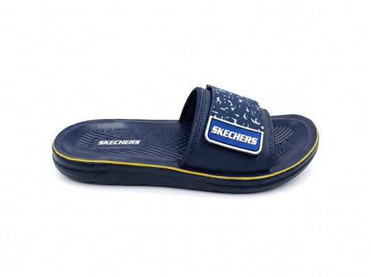 Navy open-toe slide slipper with a patterned broad strap and yellow sole trim