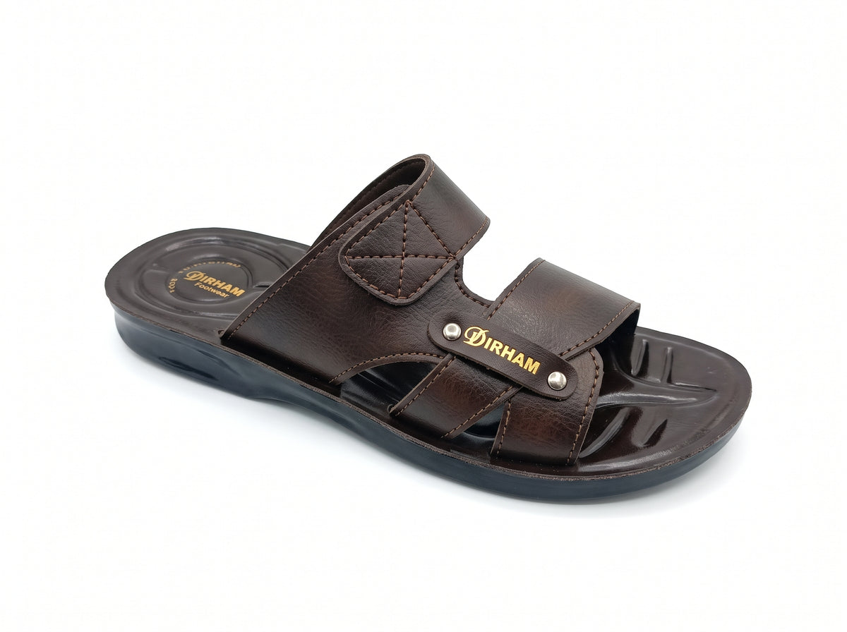 Dark brown open-toe slipper with overlapping straps, stitching and metallic studs